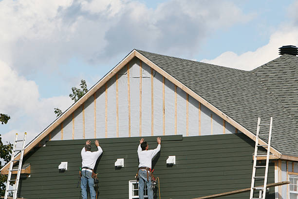 Professional Siding Installation technician working in Essex, MD
